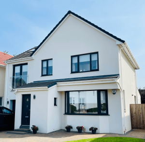 White House with Black Casement Windows